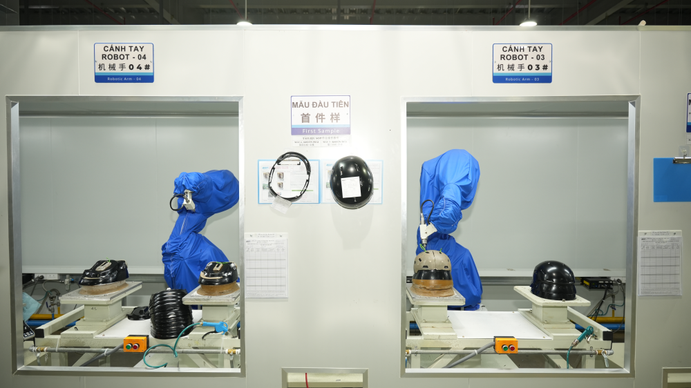 Production line applying robotic arms at the plant