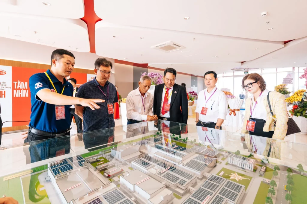 Guests tour the office area at the new Vinh Long factory.
