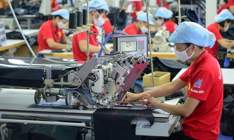 Production at a garment factory in Vietnam. Photo courtesy of Quan doi Nhan dan (People's Army) newspaper.